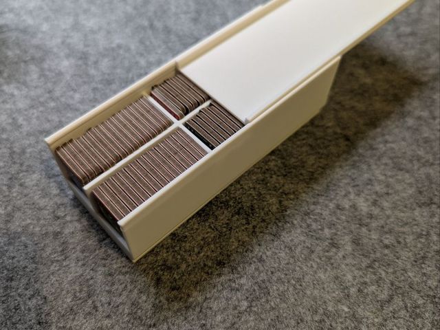 Ra scoring token holder with sliding lid half open
